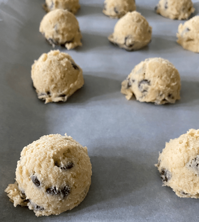 Cookie dough on a baking sheet image