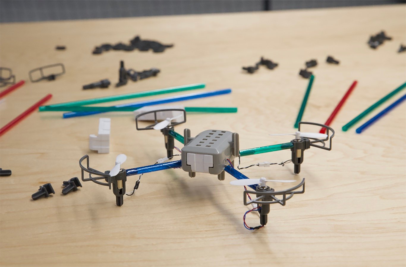 An assembled drone from the Drone Maker Kit sitting on a table.